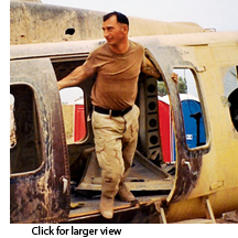 Bobby Heline exiting a helicopter in Iraq