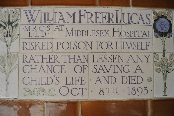 Plaque in London's Postman's Park memorial for William Freer Lucas who saved a child