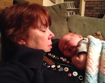 Peggy Frezon with her first grandchild, Grace