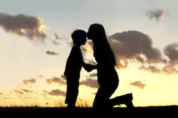 Mother kissing her son. Photo by Christin Gasner, Thinkstock.