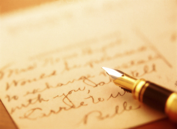 Writing a card. Photo by A_teen, Thinkstock.