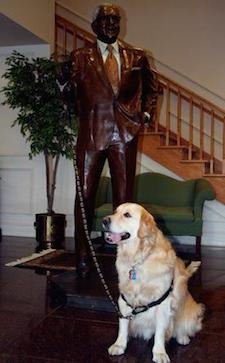 Millie with a statue of Dr. Peale at Peale Center in Pawling, NY.