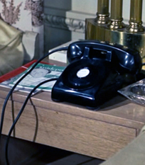 The telephone table from North by Northwest with a copy of Guideposts on it