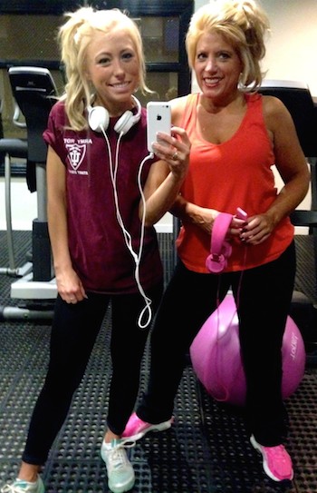 Michelle and her daughter Ally at their gym.