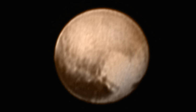 Does Pluto have a heart? Photo credit: NASA-JHUAPL-SWRI