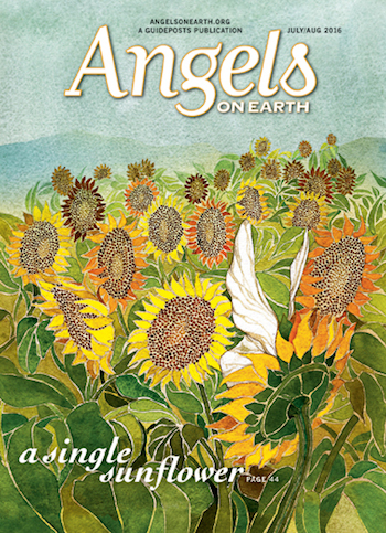 An artist's rendering of an angel in a field of sunflowers on the cover of the July-August 2016 issue of Angels on Earth magazine