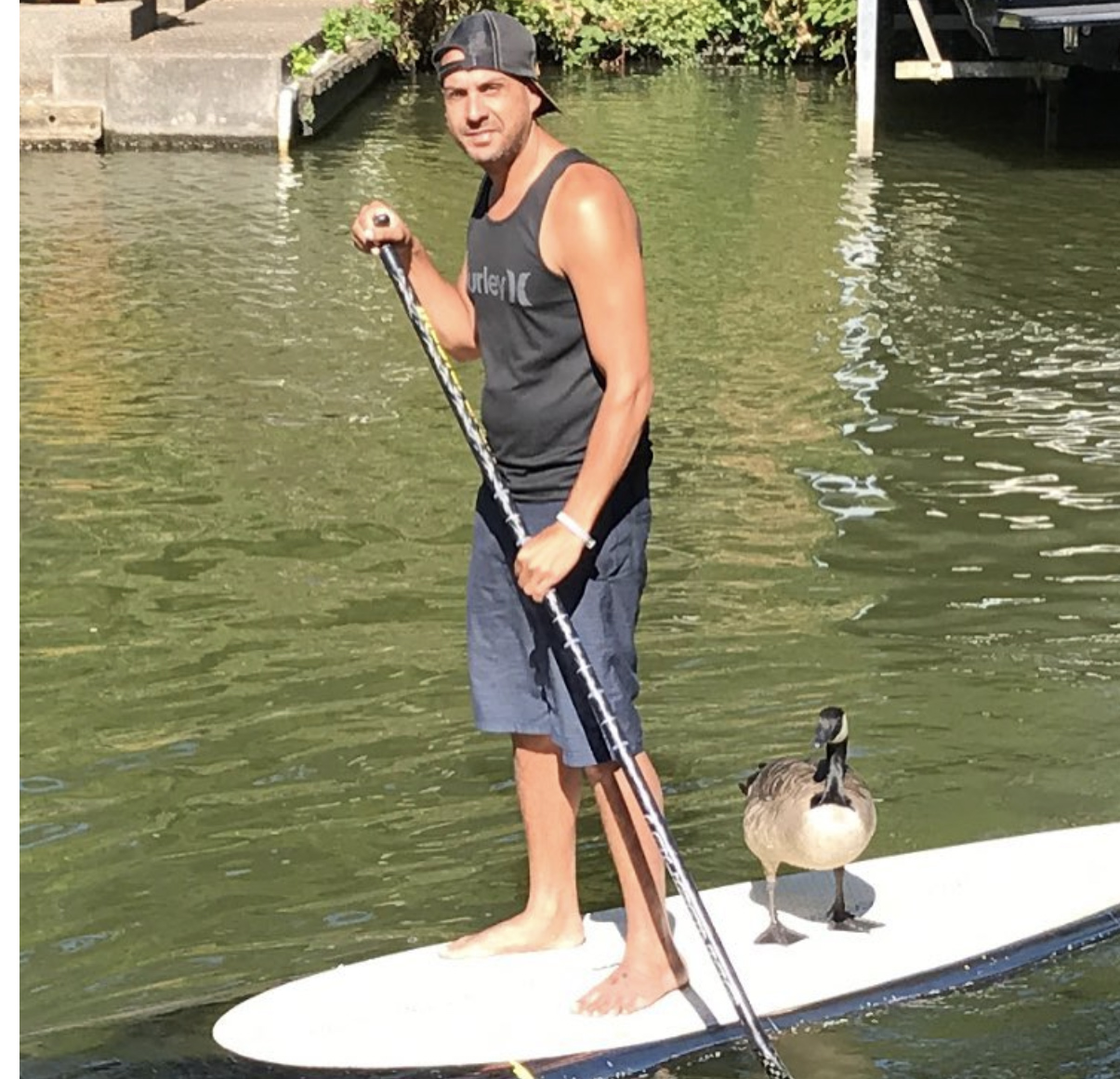 Mike and Kyle paddleboarding