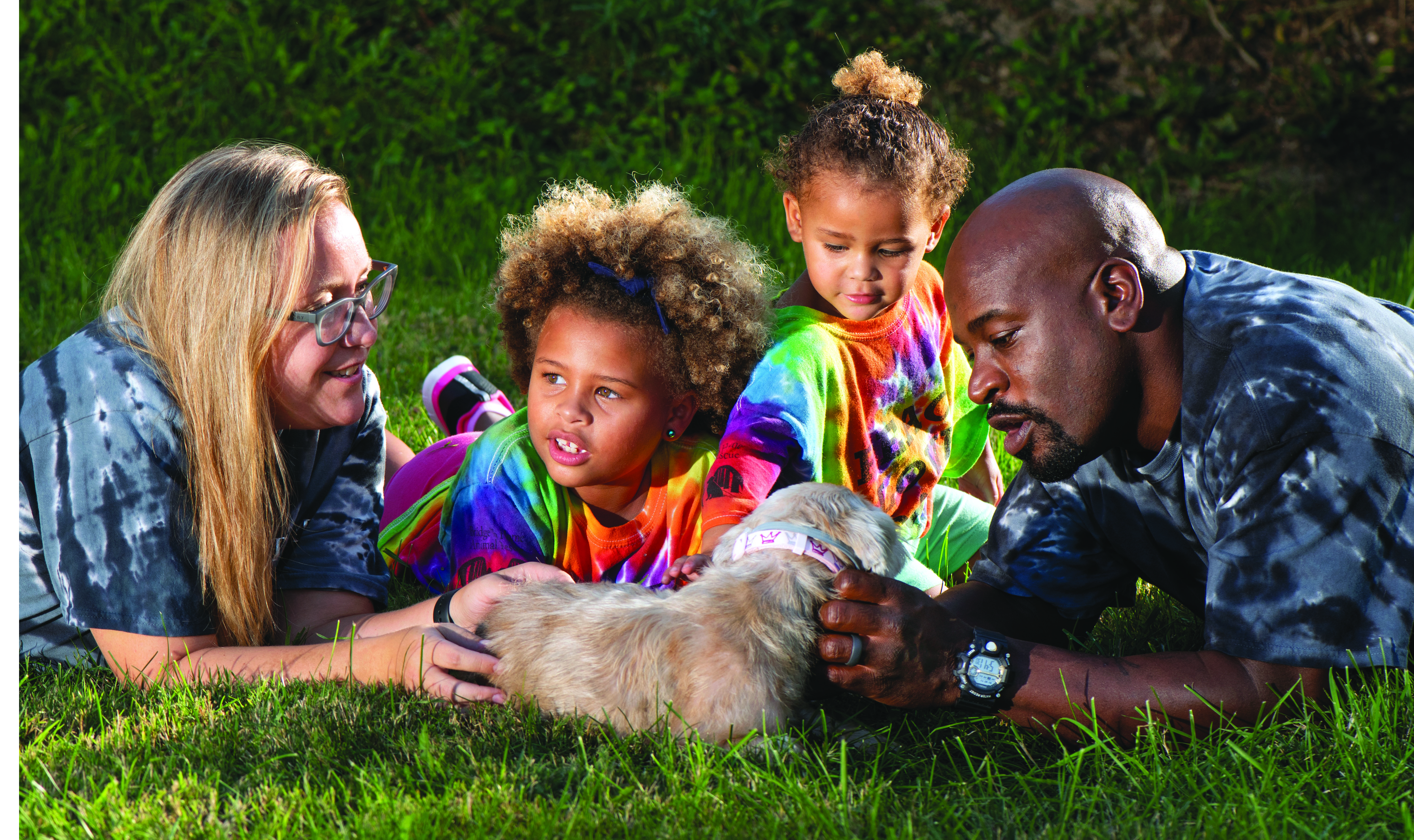 Omar Brooks, his family and their foster dog